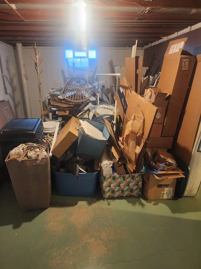 Roll-off dumpster container at job site for Yard Waste Dumpster Rental in North Branford